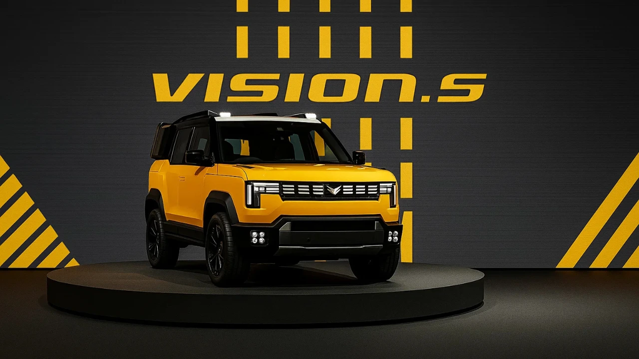 Yellow Mahindra Vision S concept SUV front view.