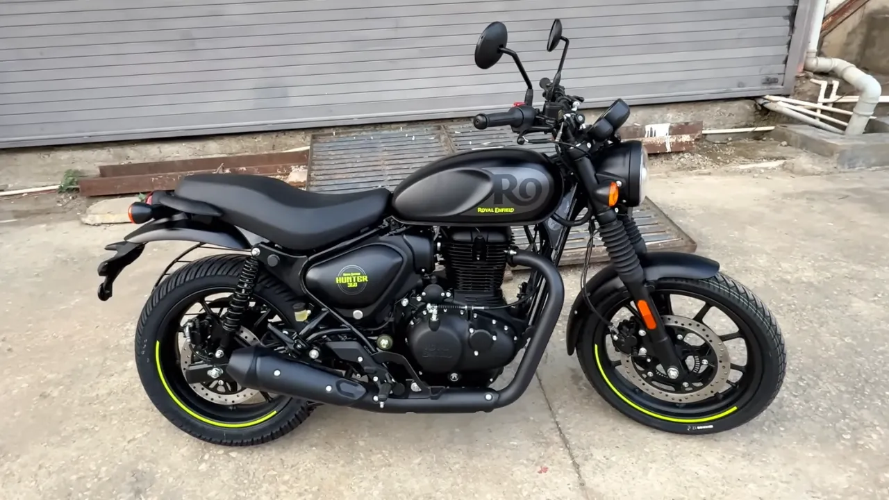 Royal Enfield Hunter 350 Graphite Grey with neon yellow accents parked on city street