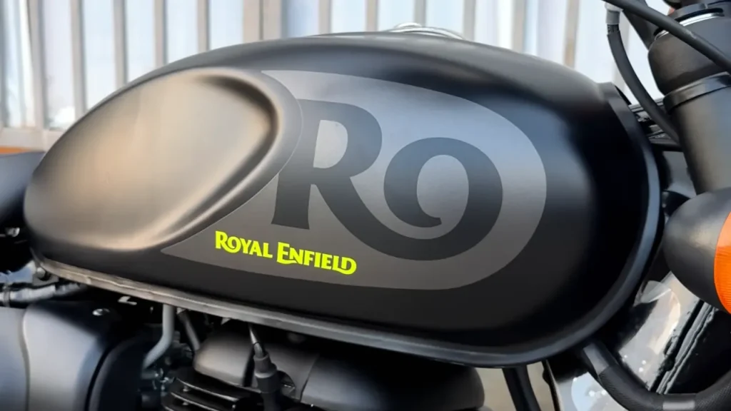 Royal Enfield Hunter 350 Graphite Grey with neon yellow accents parked on city street