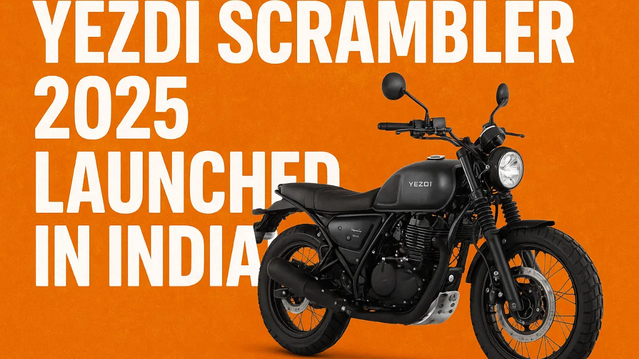 Yezdi Scrambler 2025 launched in India with bold orange background and black scrambler motorcycle.